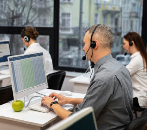 colleagues working together call center with headphones 1