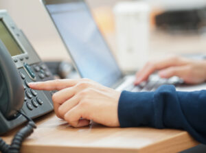 employee man hand press number telephone contact with someone 1